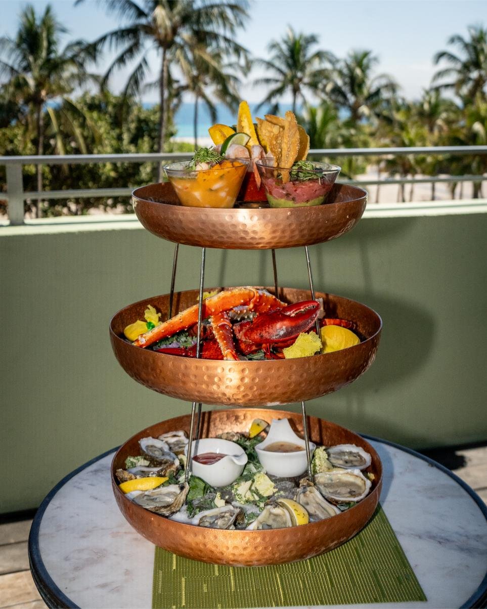 Three Tier Seafood Tower with lobster, king crab and oysters at Pelican Restaurant, Miami Beach